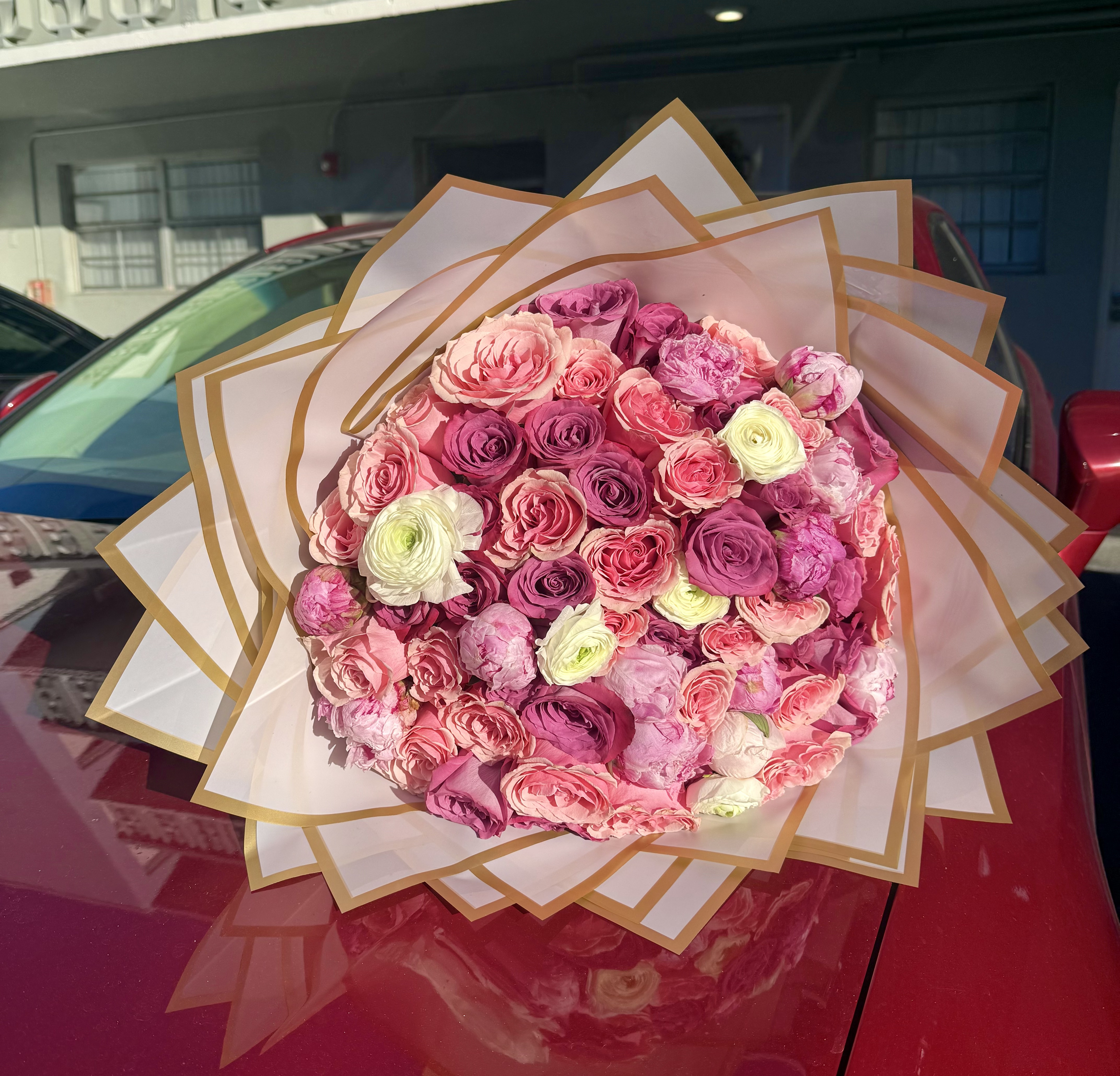 Luxury pink floral arrangement by Zuri Blooms