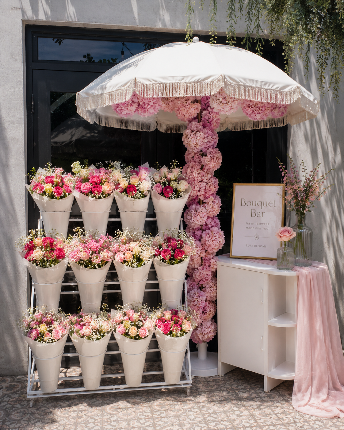 Guests crafting their own bouquets at the Zuri Blooms Bouquet Bar